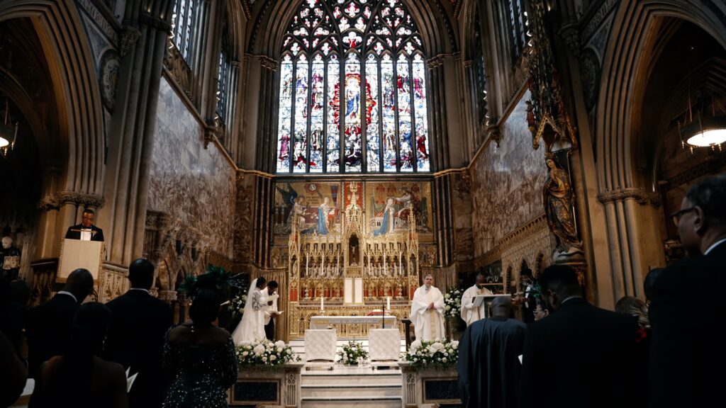 a wedding ceremony at farm street church, mayfair